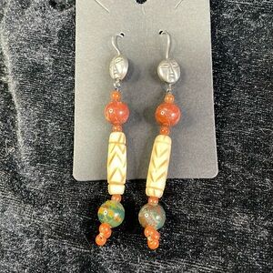 Vintage dangle earring with bone, jade, carnelian and sterling silver.